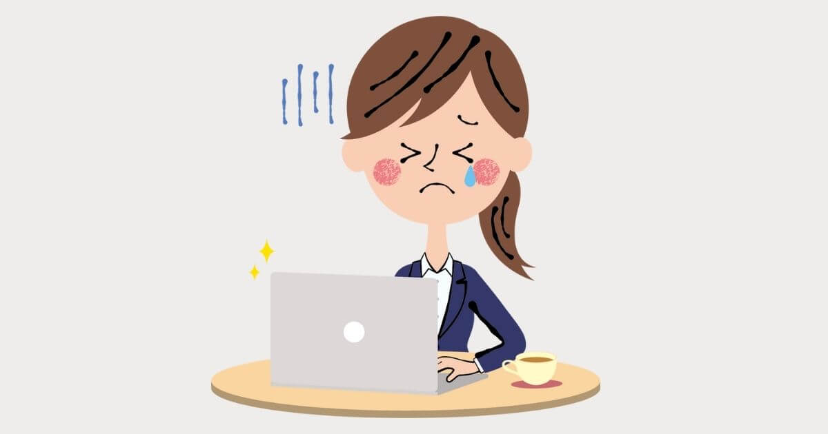 パソコンの前で涙を流し焦っている女性のイラスト