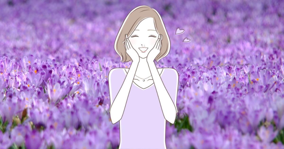 紫のお花畑の写真の背景に女性が頬を当ててご機嫌な様子のイラスト